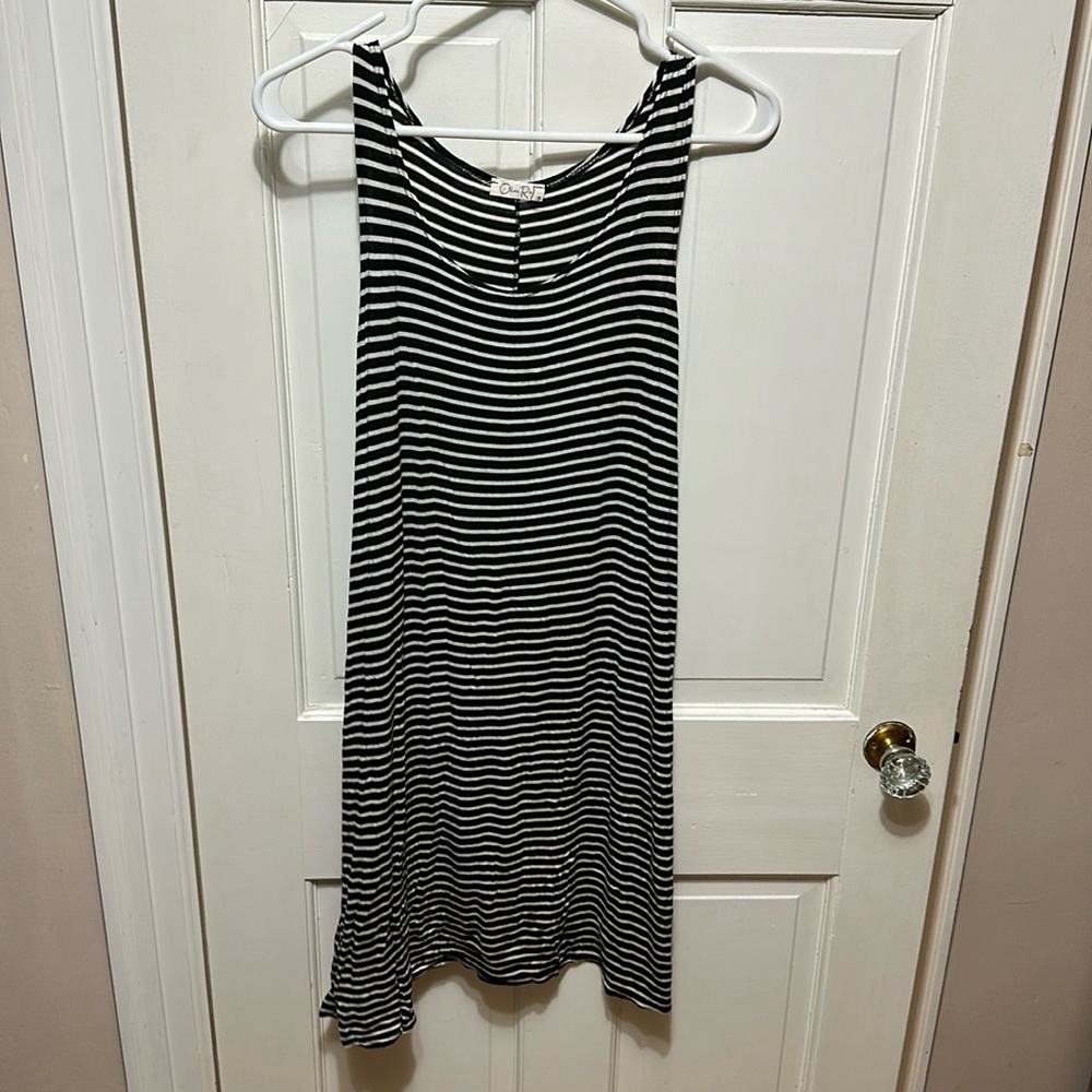 Black and white stripped dress. Short and kinda flares at the bottom